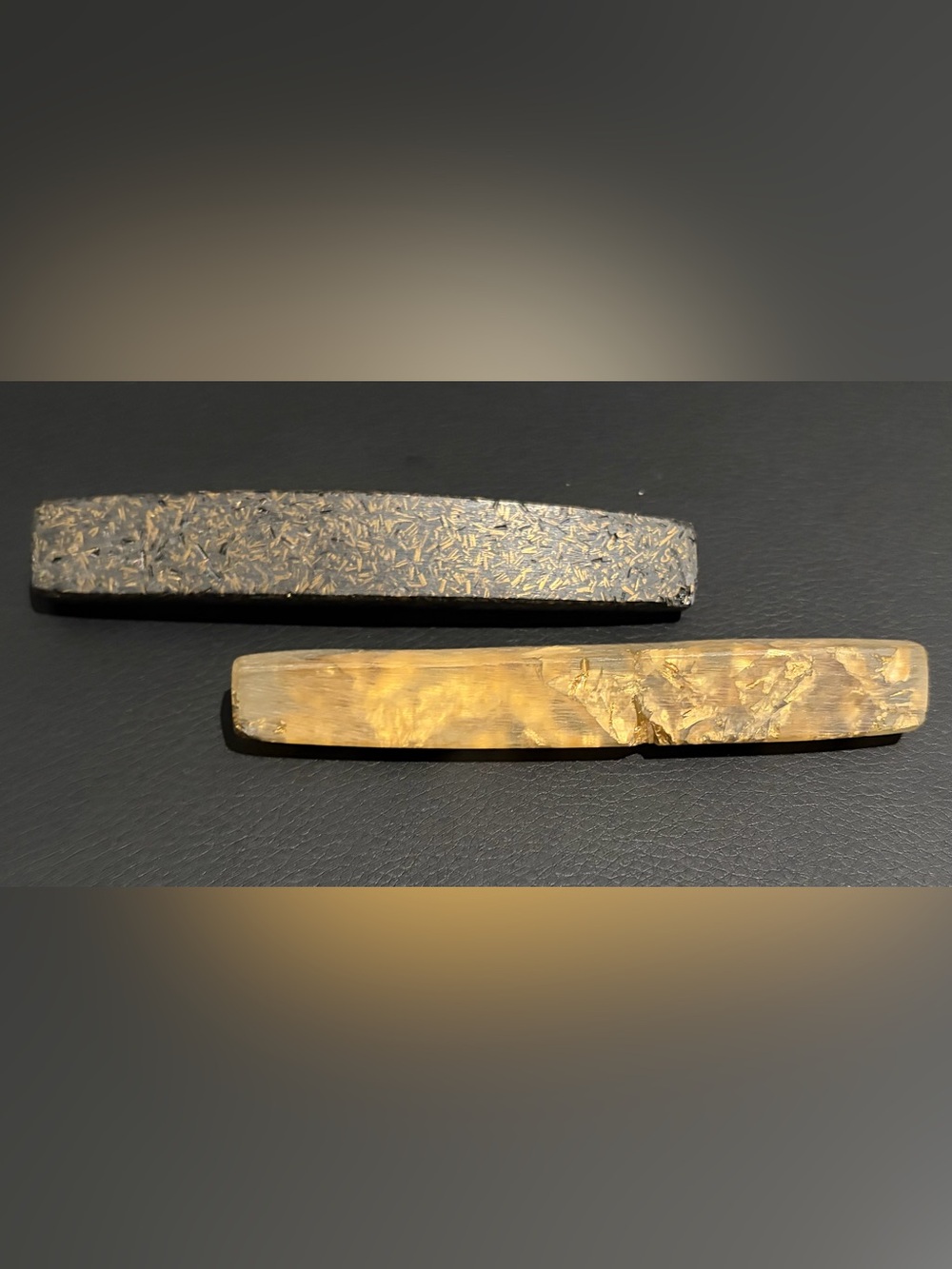 Contemporary Gold and Black Brooches